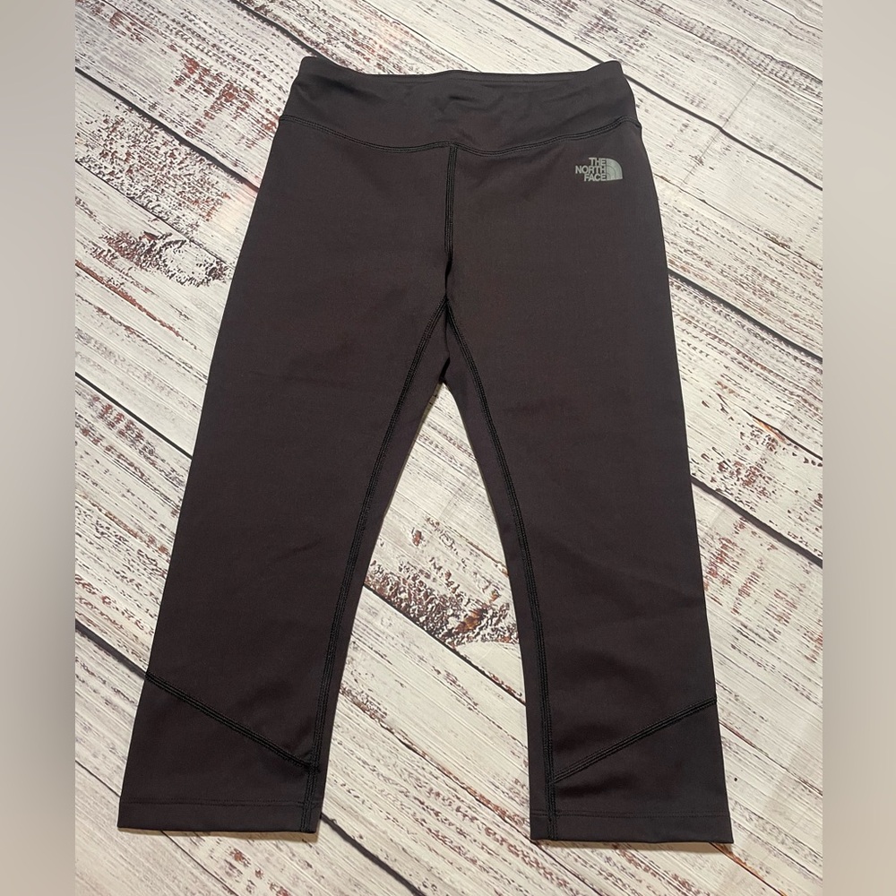 The North Face black crop leggings. Size S.